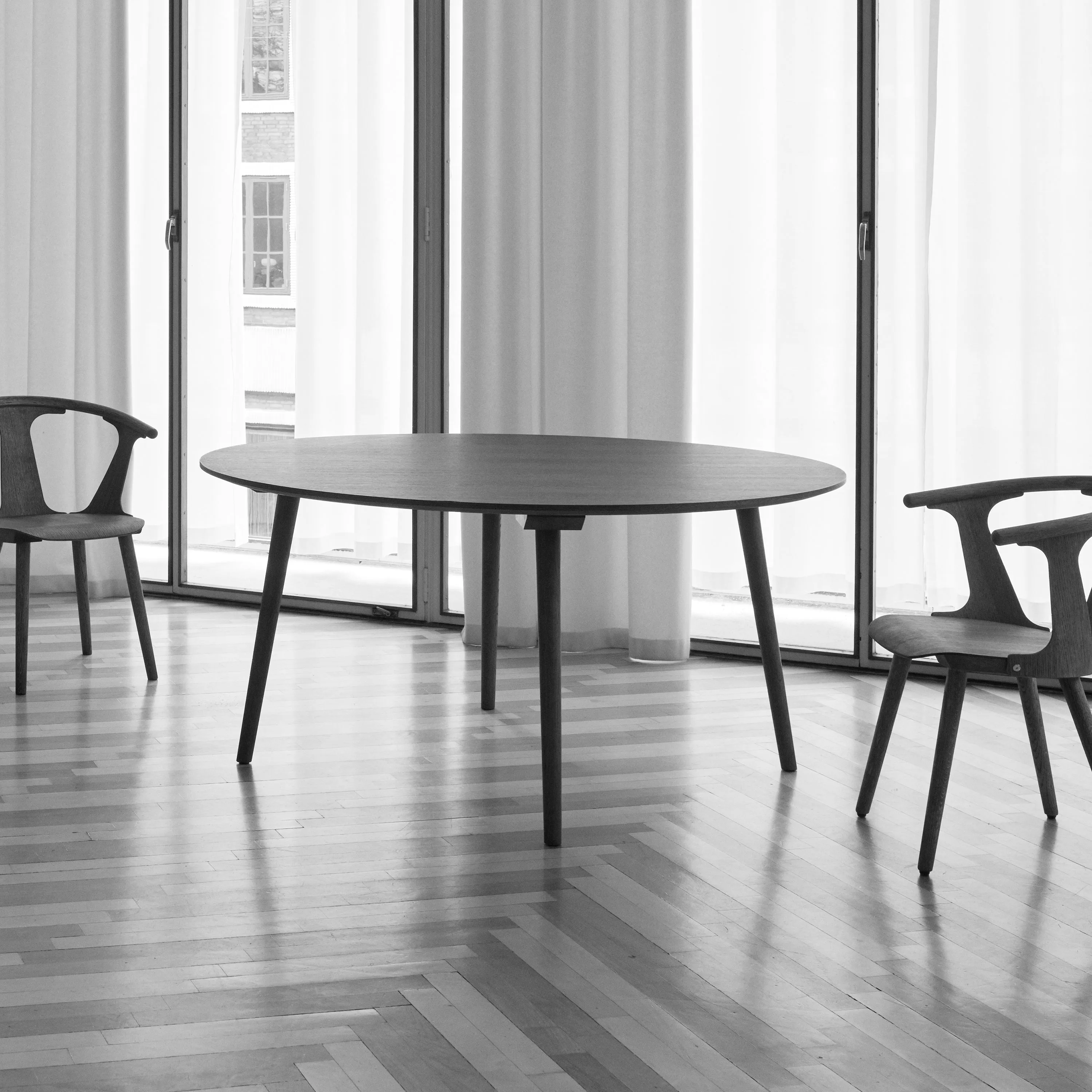 In Between Round Dining Table